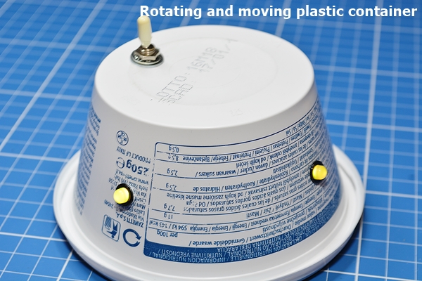 Rotating and moving plastic container